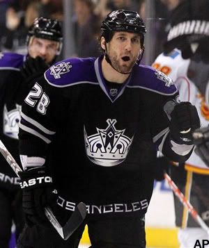 Los Angeles Kings' Jarret Stoll celebrates his goal against the Calgary Flames during the third period of an NHL hockey game in Los Angeles on Monday, March 21, 2011. The Kings won 2-1 in a shootout. (AP Photo/Danny Moloshok)