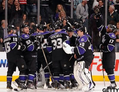 The Los Angeles Kings celebrate a 2-1 shoot-out win over the Calgary Flames during the game at Staples Center on March 21, 2011 in Los Angeles, California. (Photo by Andrew D. Bernstein/NHLI via Getty Images)