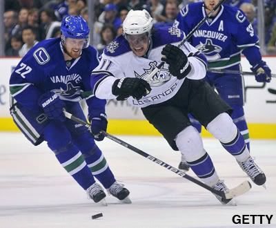 Anze Kopitar #11 of the Los Angeles Kings chases down a loose puck while being chased by Daniel Sedin #22 of the Vancouver Canucks in Game One of the Western Conference Quarterfinals during the 2010 NHL Stanley Cup Playoffs on April 15, 2010 at General Motors Place in Vancouver, British Columbia, Canada. (Photo by Rich Lam/Getty Images)