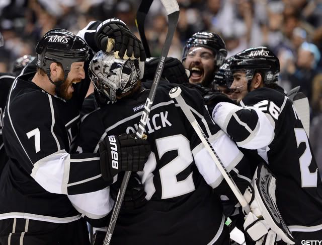 Rob Scuderi #7 and Jonathan Quick #32 of the Los Angeles Kings celebrate a 3-1 win and a 4-0 game sweep of the St. Louis Blues in Game Four of the Western Conference Semifinals during the 2012 NHL Stanley Cup Playoffs at Staples Center on May 6, 2012 in Los Angeles, California. (Photo by Harry How/Getty Images)