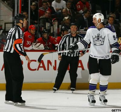 Ryan Smyth #94 of the Los Angeles Kings has words with referee Eric Furlatt (27) after having a goal called back for a high-stick in a game against the Ottawa Senators at Scotiabank Place on November 22, 2010 in Ottawa, Ontario, Canada. (Photo by Phillip MacCallum/Getty Images)